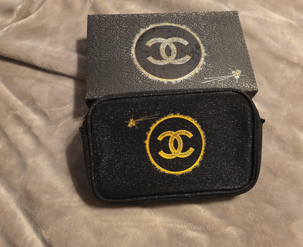 CHANEL Black and Gold Sparkle Pouch